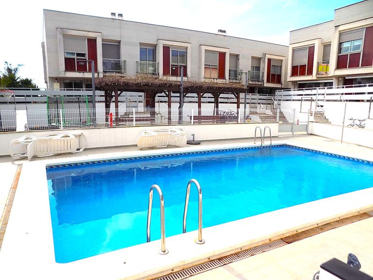 Piscina comunitaria en Casa Adosada en el Puig
